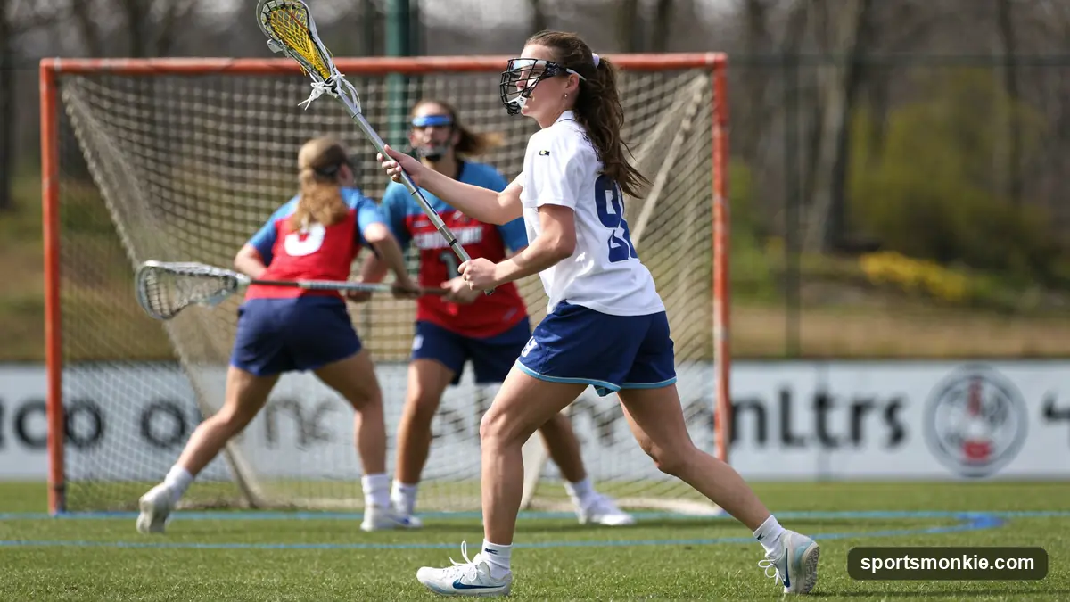 A women's lacrosse attacker lining up a free position shot in front of the goal as defenders clear the arc