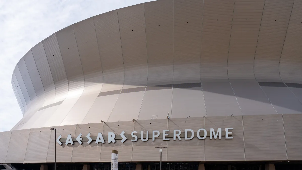 File photo from 4 February 2026: the Caesars Superdome, home of the New Orleans Saints. It does not show Benson's Quarterback Club speech. The cropped 16:9 derivative is offered under the same CC BY 4.0 licence as the original.