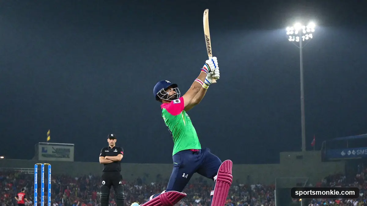 Cricket batsman driving through the covers under floodlights in an ODI
