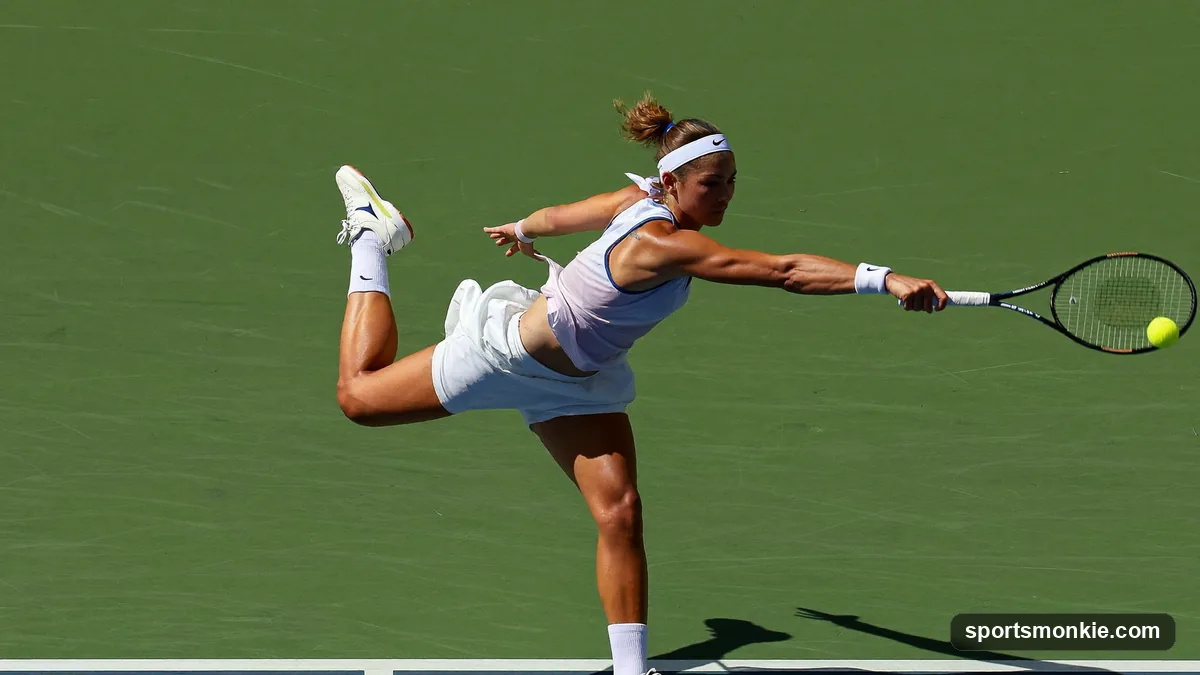 A tennis player hitting a topspin forehand with a low-to-high swing and contact point out in front