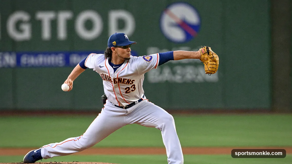 Close-up of a two-seam fastball grip showing fingers along the narrow seams