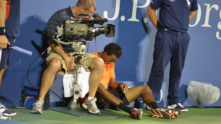 File photo from 29 August 2013: Gael Monfils playing at the US Open. It does not show his final match in 2026. Cropped 16:9 derivative offered under the same CC BY 2.0 licence as the original.
