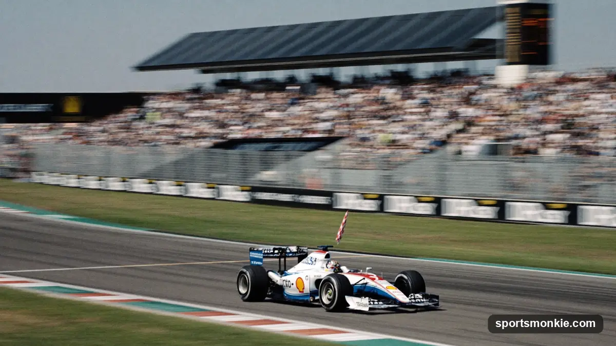 Formula 1 car crossing the finish line first as a checkered flag waves