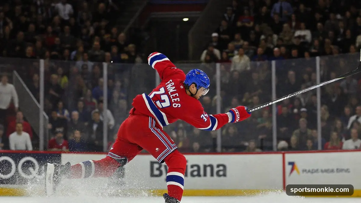 Hockey player firing a shot on goal as the puck heads toward the net