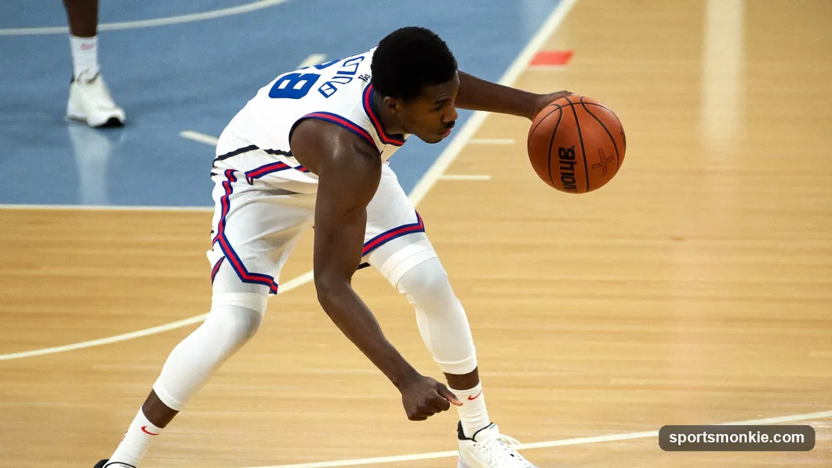 NBA guard planting his outside foot and pushing backward off the dribble to create space for a step-back jump shot