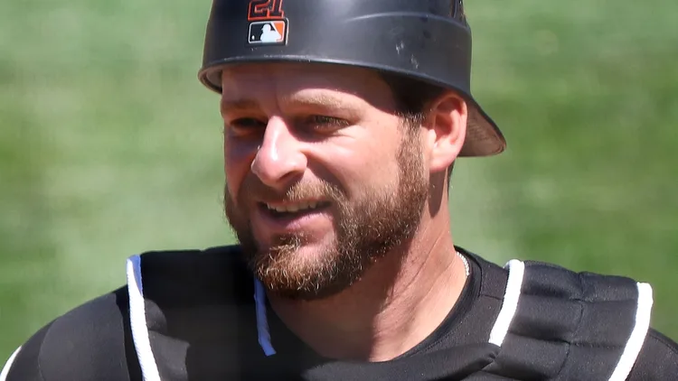 File photo of Stephen Vogt in catcher's gear during his playing career. It is used to identify the subject and does not show the press conference. The image is CC0; the 16:9 cropped derivative is offered under the same terms.