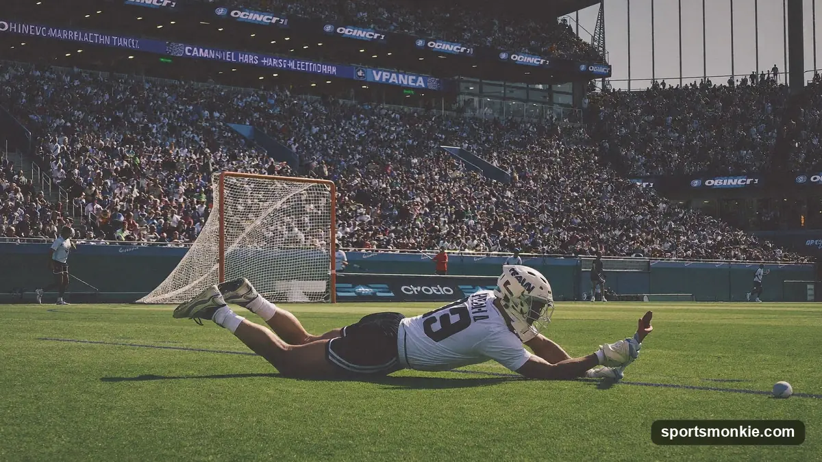 Lacrosse goalkeeper starting a clear by passing the ball upfield to a teammate