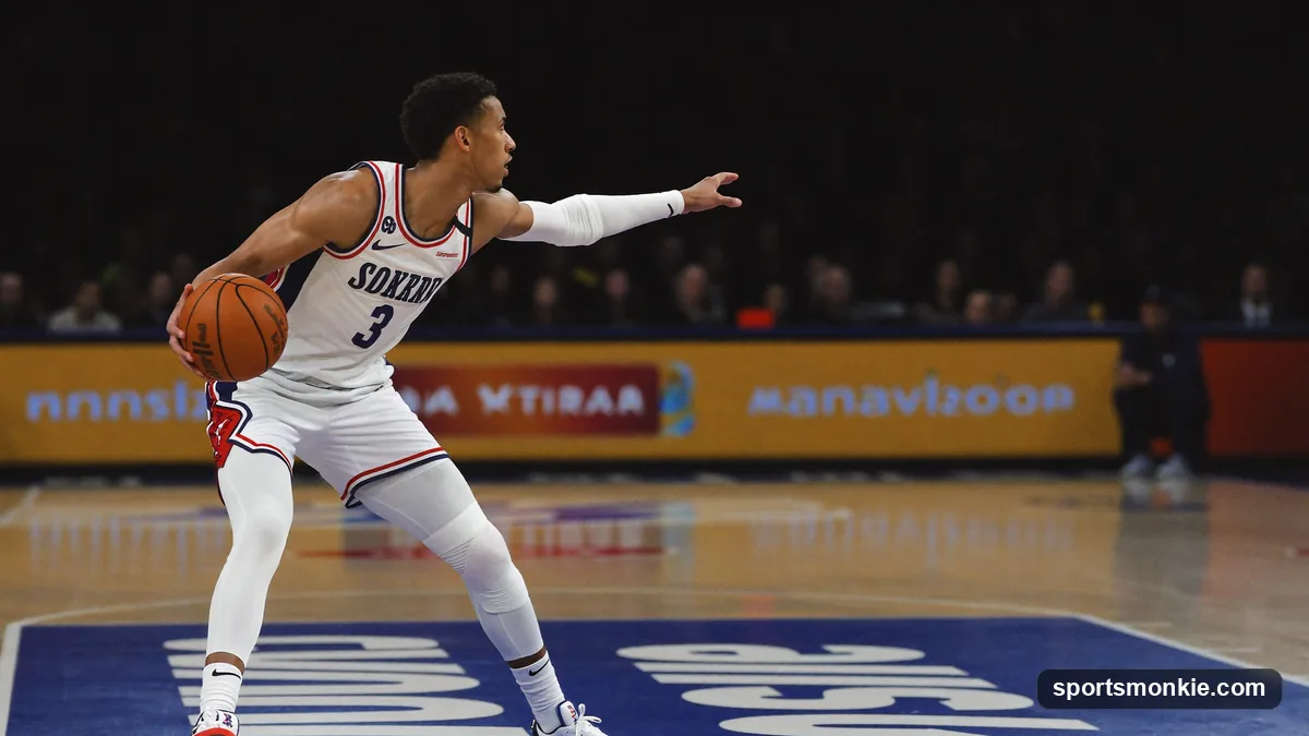 A basketball point guard dribbling the ball up the court while directing teammates