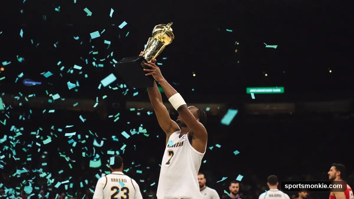 Young NBA player lifting the championship trophy amid celebration