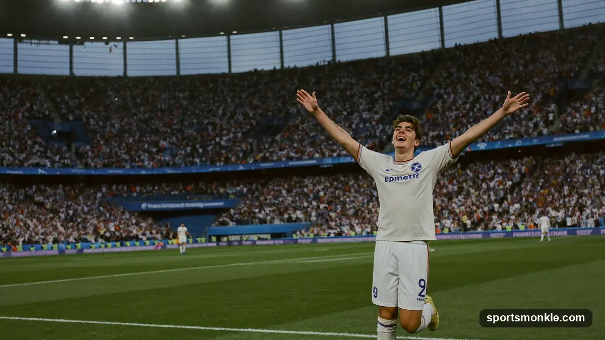 Young footballer celebrating with the World Cup trophy raised overhead
